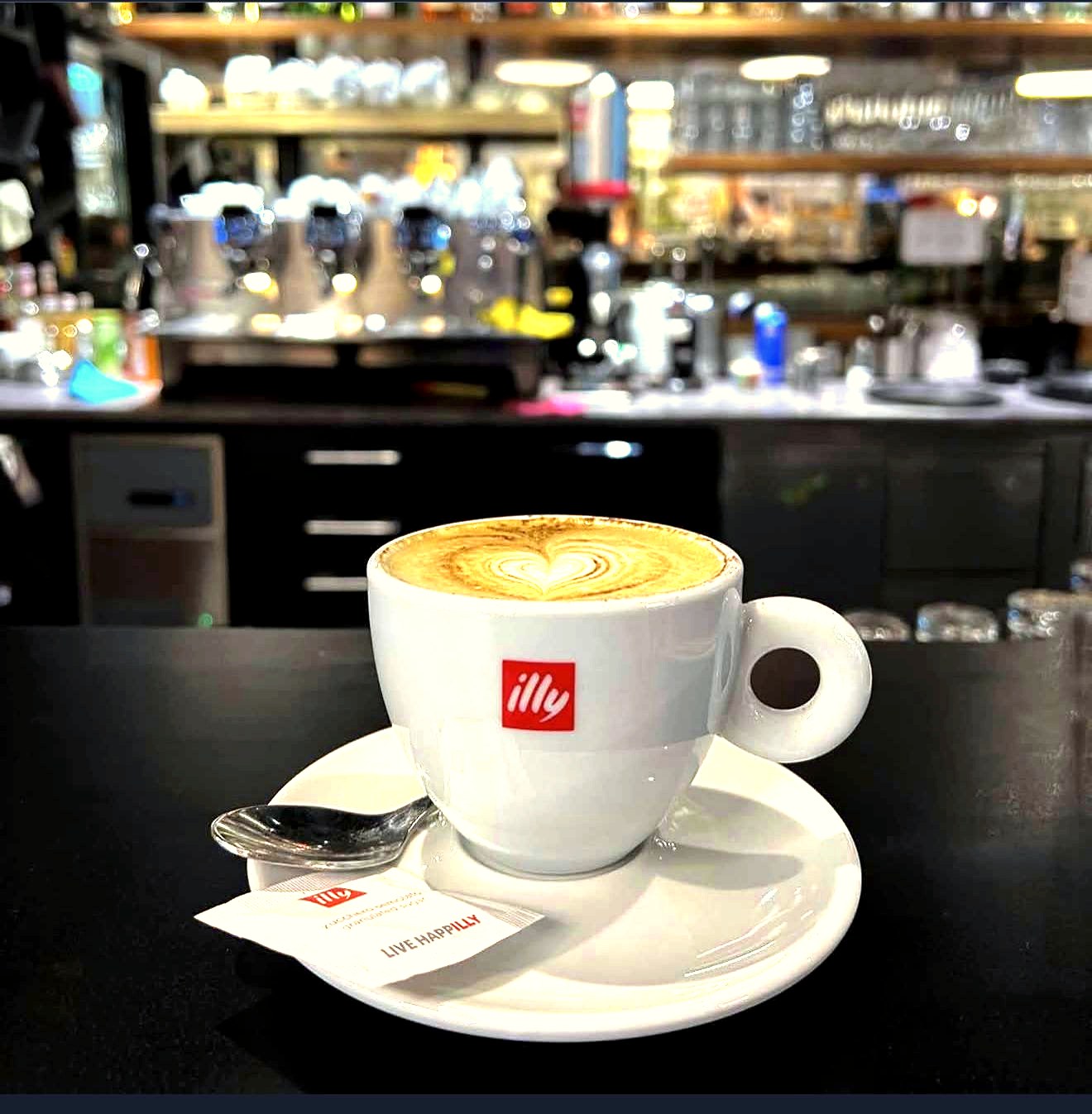 Cappuccino with heart latte art at daylounge