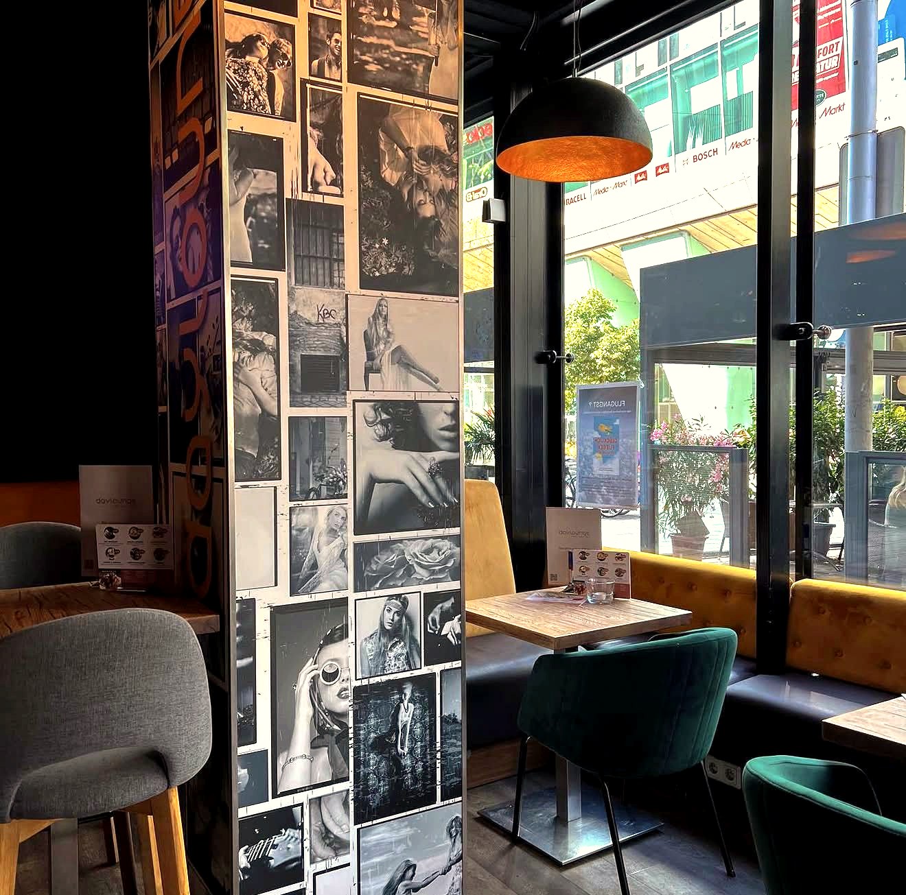 daylounge seating area with photo-wall column and street view